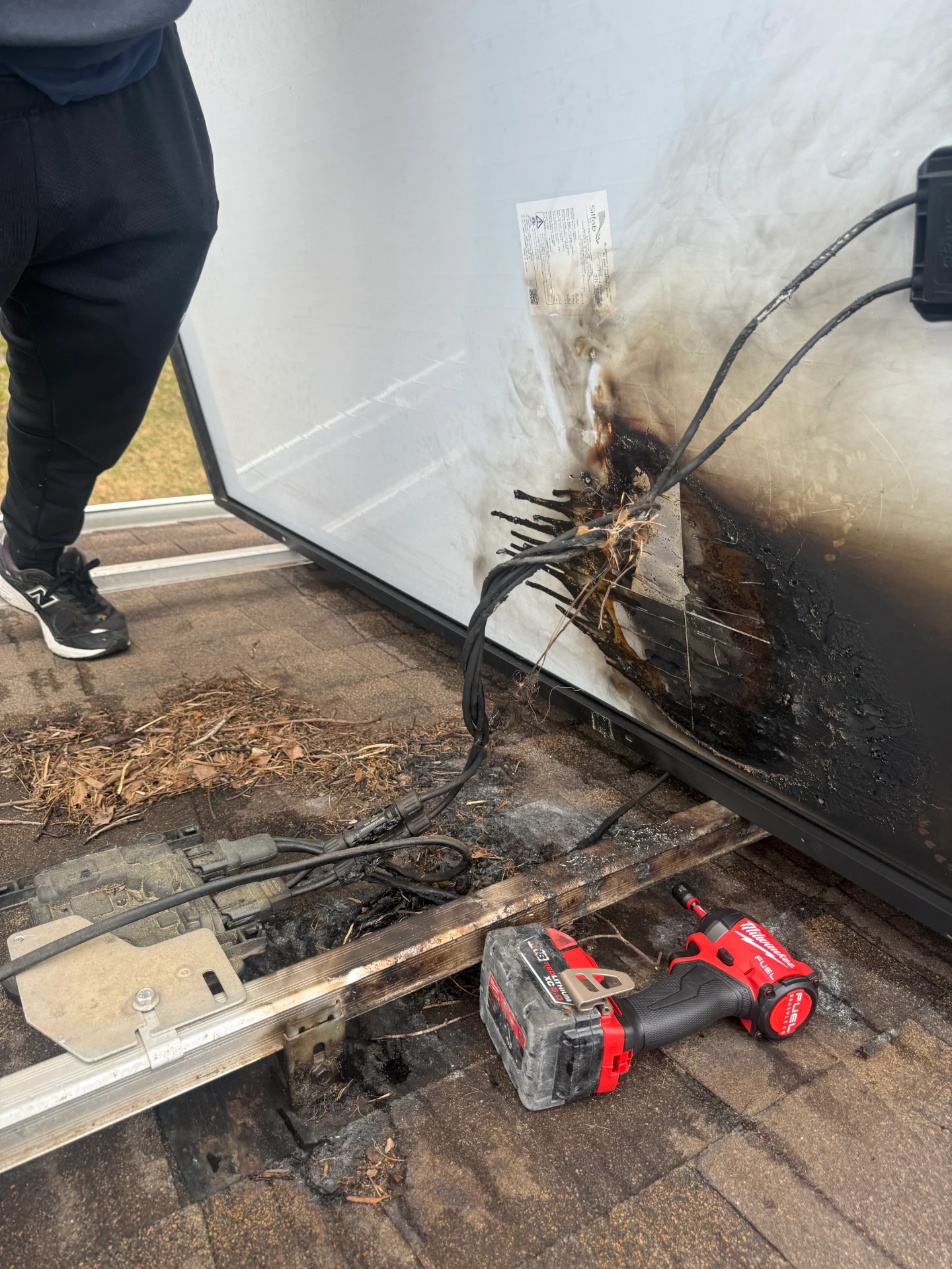 Burned solar panel after an animal nest started a fire